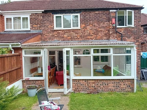 old tired looking conservatory in Prestwich